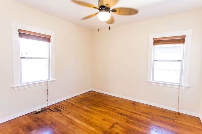 Building Photo - Charming 2 Bedroom House with Expansive Wo...