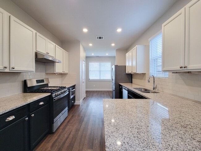 Building Photo - Very functional floor plan, has game room/home office, covered back patio on a big lot. Primary o...