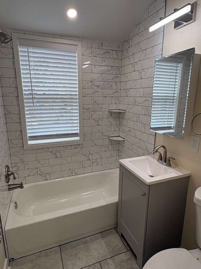 Building Photo - Beautifully Rebuilt Three Bedroom Duplex Near Four Mile Run and I-395