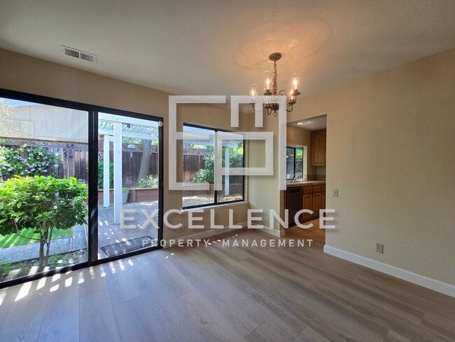 Building Photo - Beautiful 3/2 House - Dogs Negotiable, All New LVT Flooring, Covered Patio and Yard