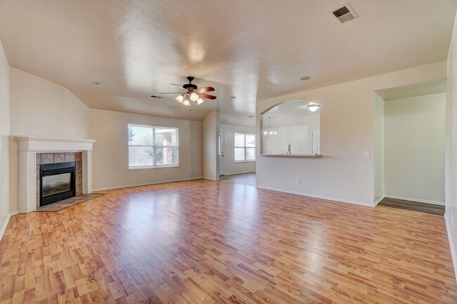 Building Photo - Spacious 4-Bedroom Home with Corner Firepl...