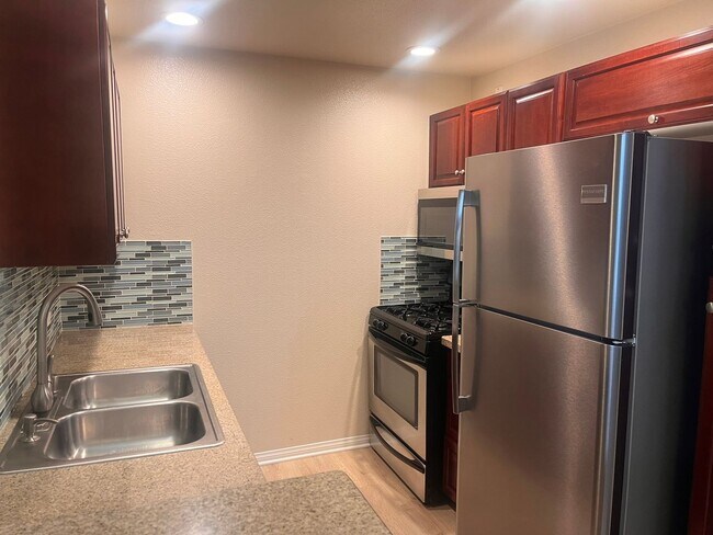 Building Photo - 2 Bedroom 2 Bathroom Plus Loft in Prime Woodland Hills
