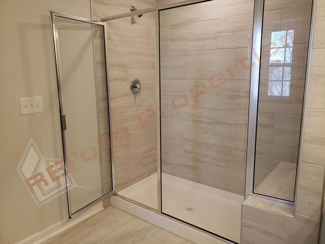 Building Photo - Brand New 3 BR 1-Car Garage Townhome in Do...