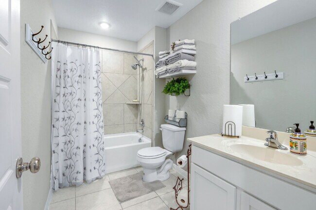 Building Photo - **Stunning 4BR/3BA Home with Dual Primary Ensuites & Modern Upgrades!**