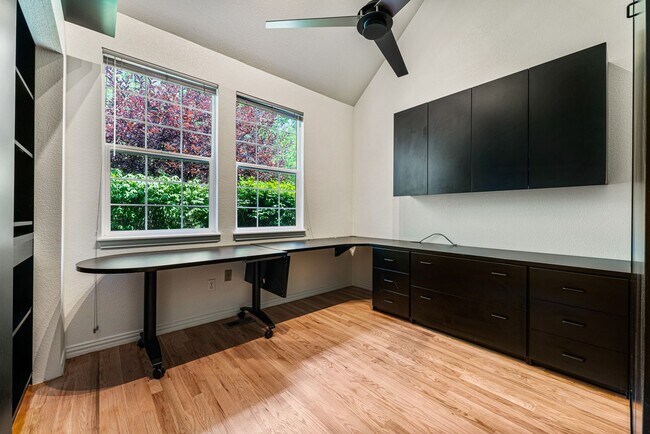 Building Photo - Gorgeous Townhome With 2-Car Garage and Ce...