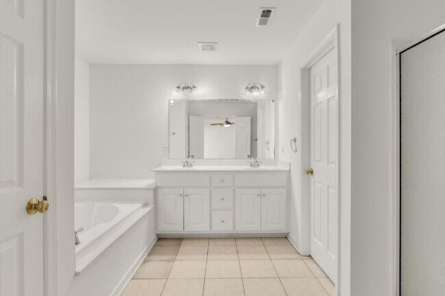 Building Photo - Spacious 5 Bedroom Home with 3rd Floor Suite, Fenced Yard & Community Amenities – $3,500/mo