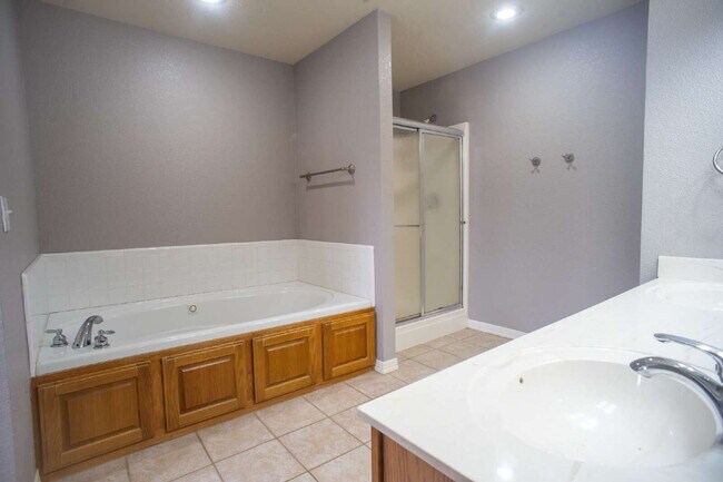 Building Photo - "Spacious 4-Bed Home with Granite Touch & ...