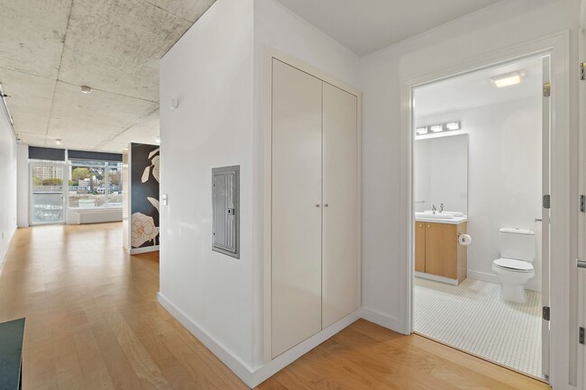 Building Photo - The Civic Condominiums - 8th floor west facing studio w/parking/ most utilities/concierge/views (...