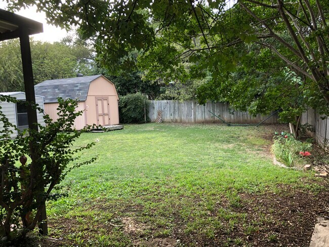 Backyard from gate - 509 Freestone Dr