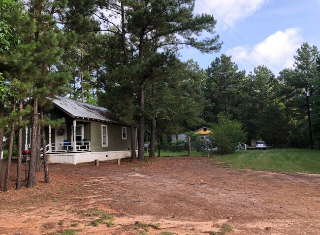 2 houses on the lot, but rear house is available. - 10557 County Road 165 N