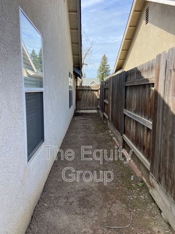 Building Photo - 5817 W Crowley Ave