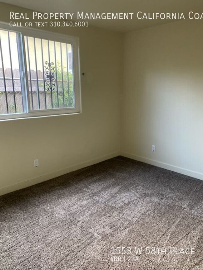 Building Photo - 1553 W 58th Pl