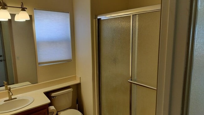 Building Photo - Townhome with Loft + Two Bedrooms/Baths - Designed for Comfort in Gated Community