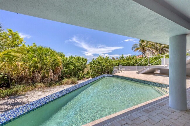 Building Photo - Beach Access & Gulf Views From This Incred...