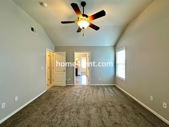 Building Photo - Beautiful Four-Bedroom Home with Three Car Garage, Wood Floors, Finished Basement and a Fenced Ya...