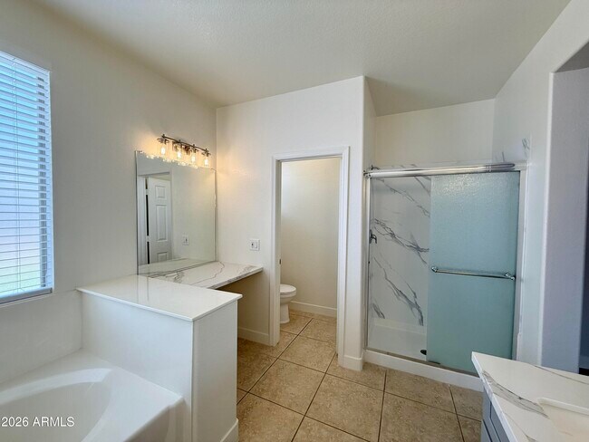 Building Photo - 6558 W Townley Ave