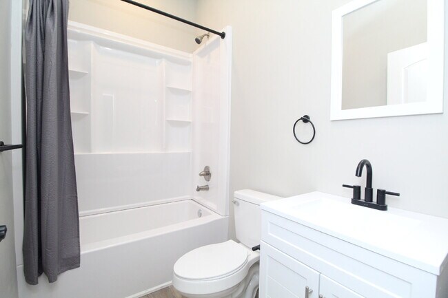 Building Photo - Fully Remodeled 2BR/2BA Attached Home with Garage, Modern Finishes, Park Views & Prime Downtown P...