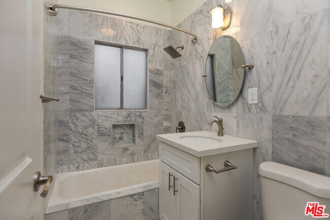 Building Photo - 7223 Willoughby Ave