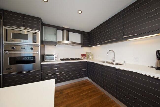 Building Photo - Ultimate Luxury Living: Fully Furnished Co...