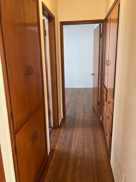 Hallway lined with Cabinets & Drawers - 1242 S Point View St