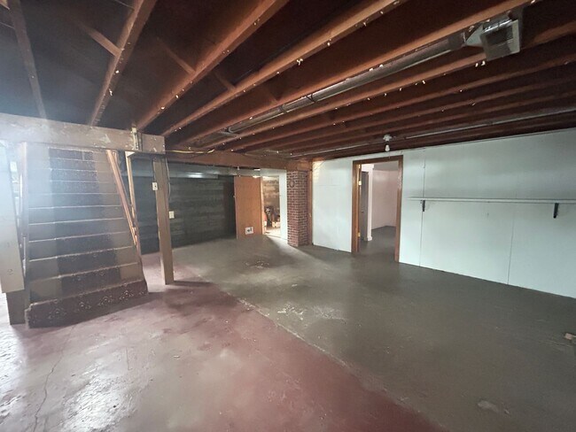 Building Photo - Bigfork Rodeo Farmhouse~ Fenced garden, greenhouse, garage, barn and shop!