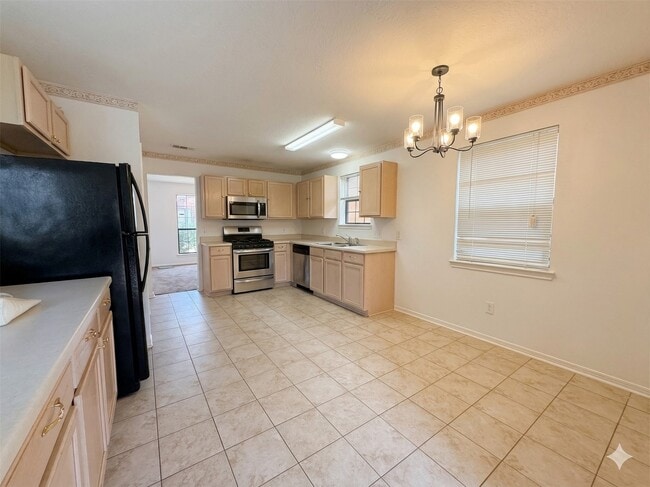 Building Photo - 13834 Trumpetvine St