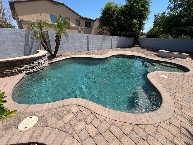 Building Photo - Gorgeous, upgraded home with a sparkling p...