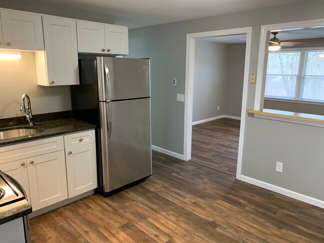 Kitchen into living room - 39 Old Amherst Rd
