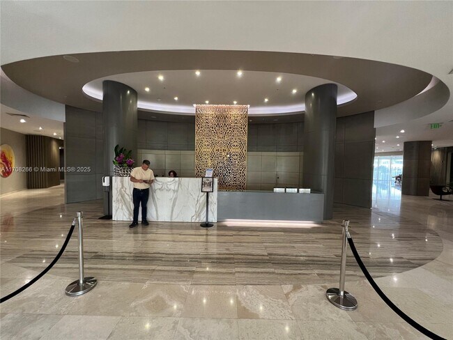 Building Photo - 10275 Collins Ave