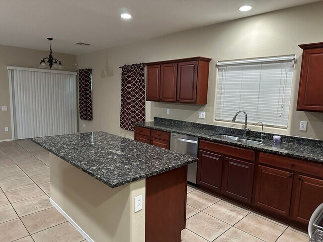 Building Photo - Charming 3 Bed + Den 2.5 Bath Home with 2 car attached EV garage with community pool !!