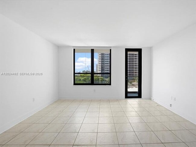 Building Photo - 10185 Collins Ave