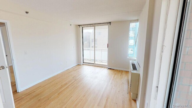 Building Photo - 102-30 Queens Blvd