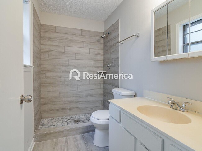 Building Photo - Fully renovated 3BR/2BA with fenced in yard