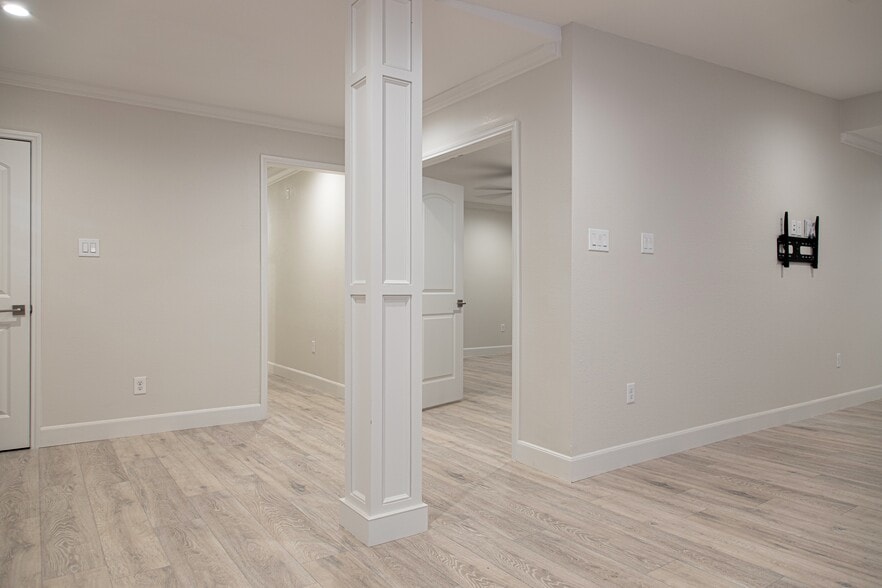 Entry to media room and hallway to bedrooms - 3619 Braeswood S Blvd
