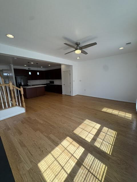 Building Photo - Modern End-Unit Townhome – Solar Powered, Garage, Pet Friendly, and HOA Amenities Included