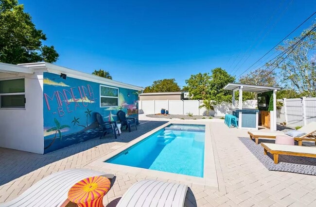 Building Photo - Utilities Included - (DECEMBER ONLY) Furnished 3-Bedroom Home with Private Heated Pool, Spa & More!