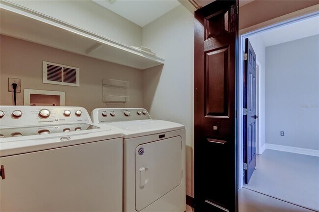 Building Photo - 9750 Lake Chase Island Way