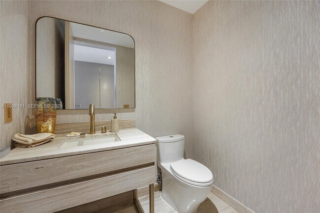 Building Photo - 18975 Collins Ave