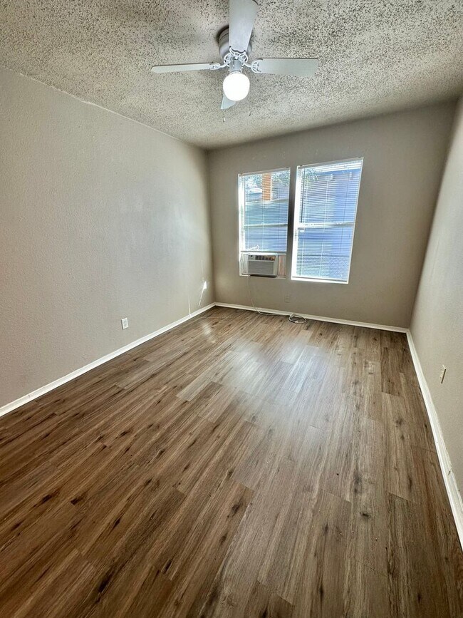 Building Photo - NOW AVAILABLE - 3 Bedroom Home + Fenced Ba...