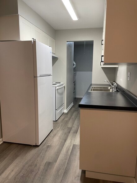 Galley kitchen, new appliances - 610 Alta Ave