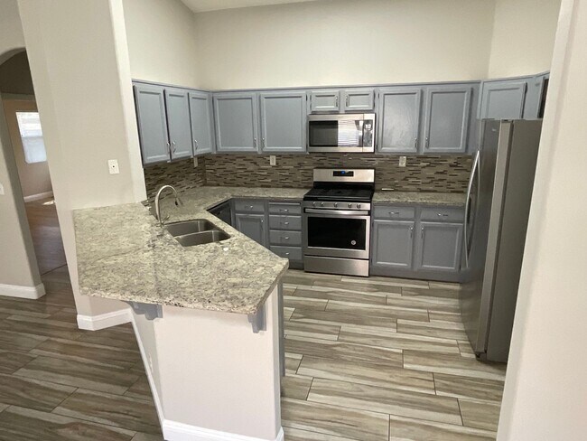 Building Photo - Single story 4br, 2bth, 2cg