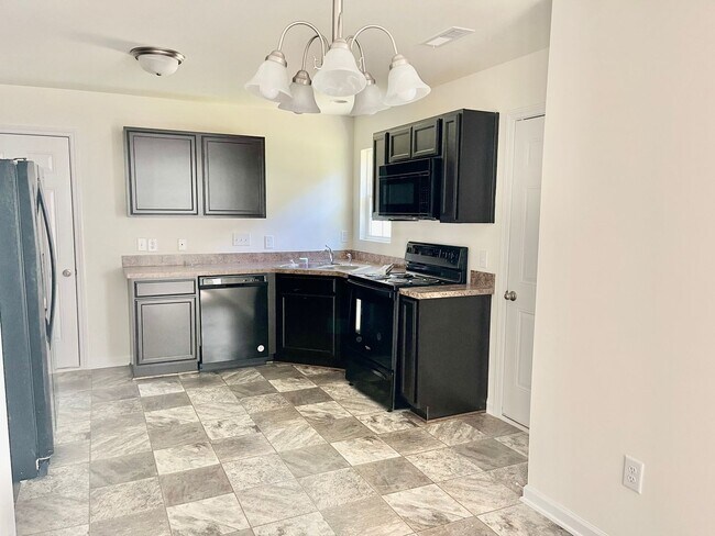 Building Photo - Available Now – Spacious 4BR Home on 1.5 Acres in Rural Hall!