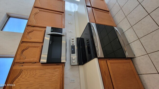 Building Photo - 8529 W Joan De Arc Ave