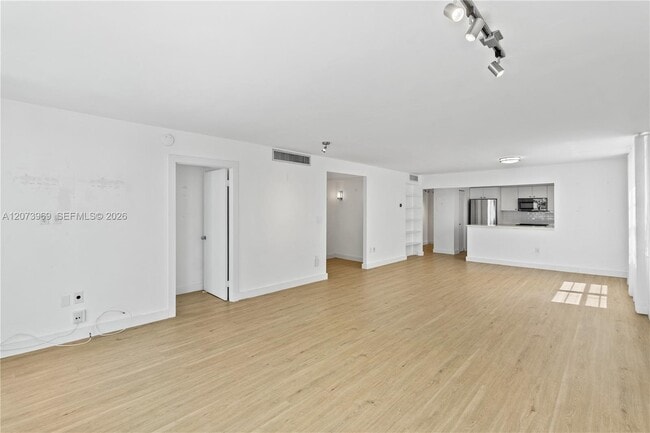 Building Photo - 9250 W Bay Harbor Dr
