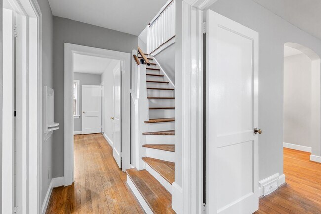 Building Photo - Brick home, Two Story, Hardwoods, DR, 2 Sun Rooms, FP, Carport!.