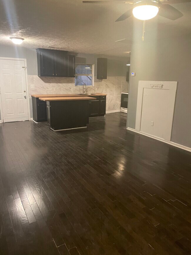 Open concept dining and kitchen with living room - 2618 Wren Cir