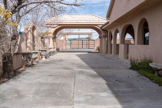 Building Photo - Desert Oasis – Furnished Executive Room in...