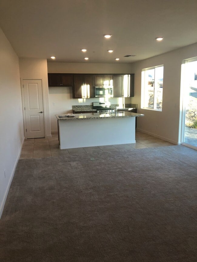Building Photo - CORNER LOT - END UNIT - NO YARD TO MAINTAIN - GRANITE - STAINLESS - GATED