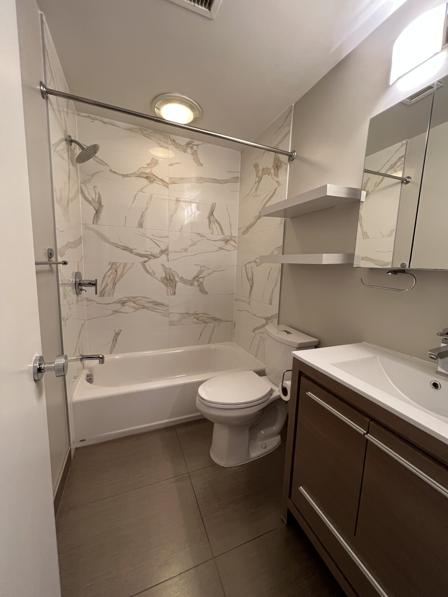 bathroom with marble tiled shower tub - 3606 Rock Creek Church Rd NW