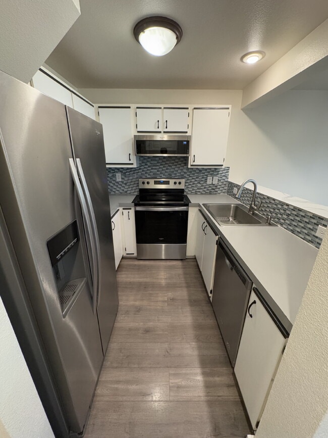 Building Photo - **Half Off Third Months Rent** 2 Bedroom Condominium